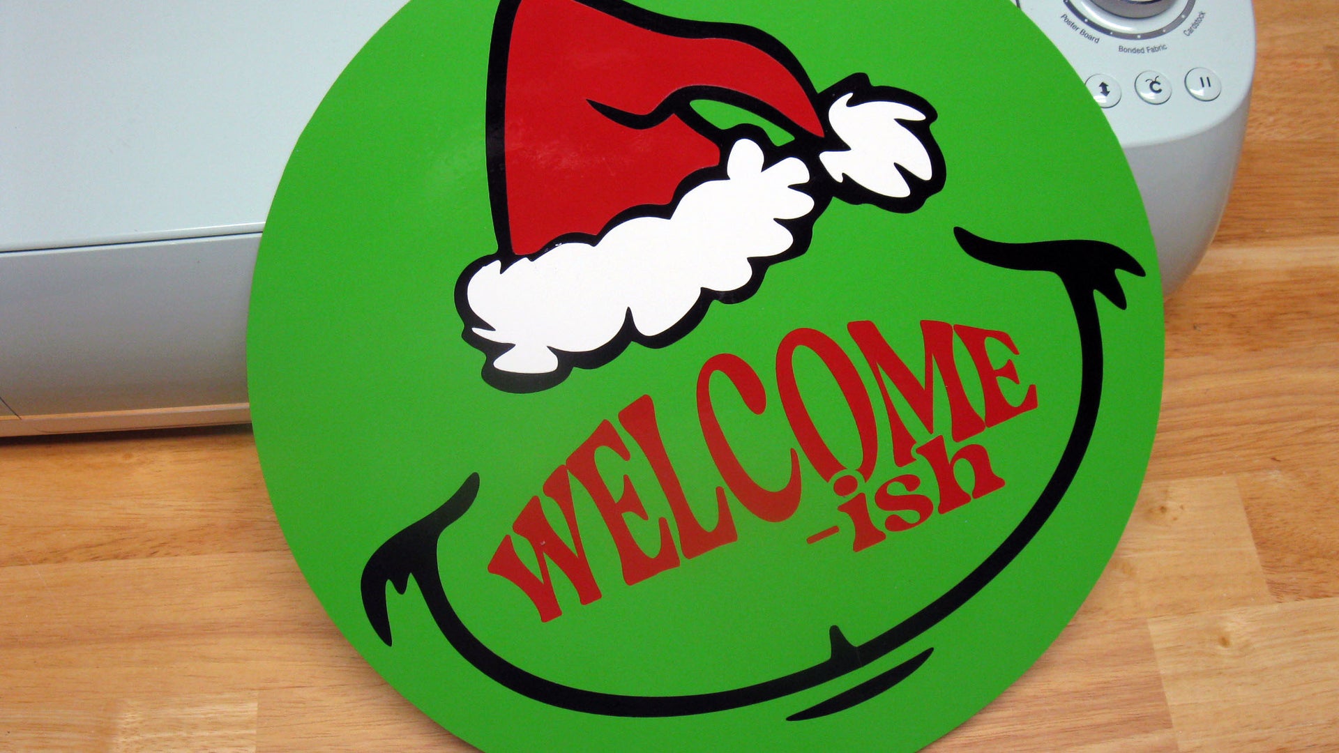 Grinch Christmas Welcome-ish Party Door Sign Using Cricut Vinyl
