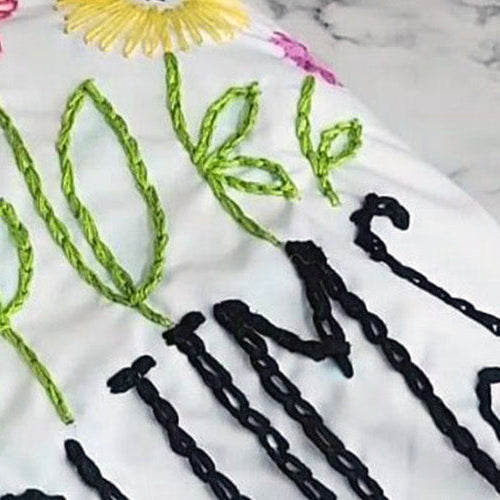 Hand Embroidered Pillow Using Cricut Washable Pen